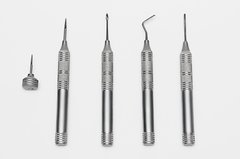 Set of periotomes and corkscrews of 5 pieces for convenient extraction of teeth and roots